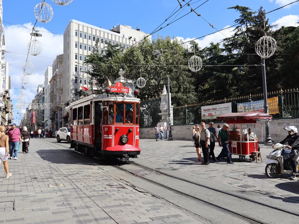 Red nostalgic tram on İstiklal Avenue